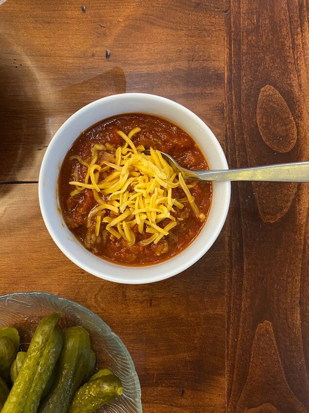5 ways to celebrate christmas on a budget, chili topped with cheese for a budget friendly holiday party