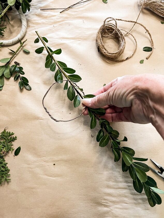 how to use greenery for christmas diy projects, Add Christmas Boxwood to floral wire to make DIY wreath for package toppers