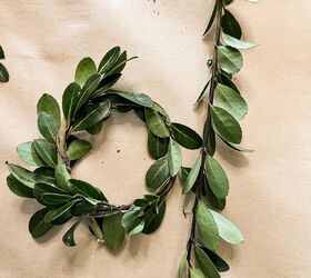 how to use greenery for christmas diy projects, Twist Christmas Boxwood Around the floral wire twice for a full wreath