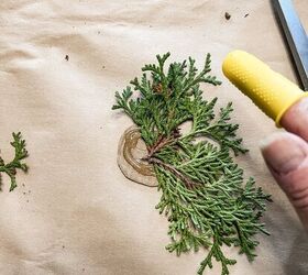 how to use greenery for christmas diy projects, Add Hot Glue and Cedar to cardboard