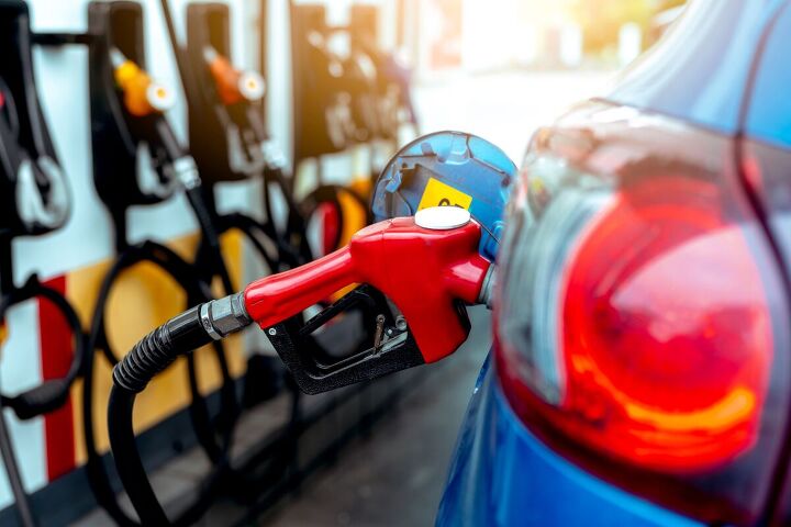 how to save money fast during the cost of living crisis, Putting gas in a car