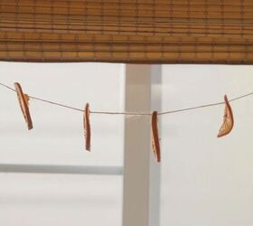 our family s minimalist christmas tree decor gifts traditions, Natural garland of dried oranges