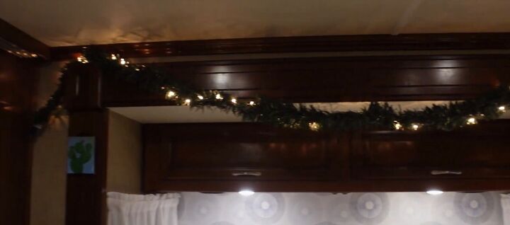 super easy rv christmas tree hack cute festive decor, Light up garland in an RV