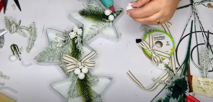 8 festive dollar tree christmas diys craft projects, Attaching bows the stars