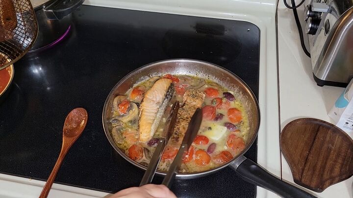 3 extreme budget meals you can make for just 3 per serving, Simmering the salmon in the sauce