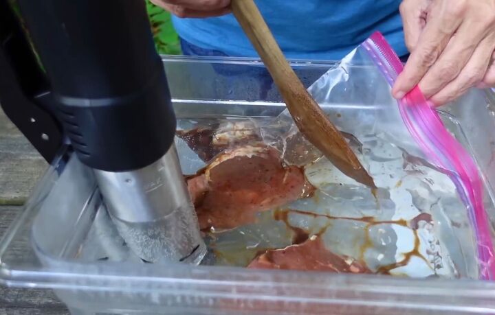 we dumped out grill for this game changing rv kitchen gadget, Removing air from the bag
