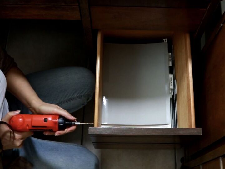 how to organize paperwork using diy hanging file folders, Drilling holes in the drawers