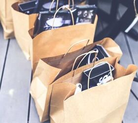 things to stop buying to save money, brown bags filled with purchases