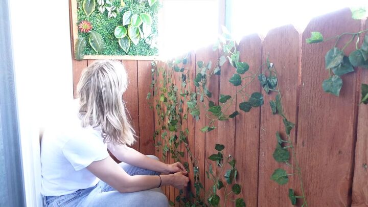 super cheap cute tiny balcony makeover ideas on a budget, Adding faux ivy to the balcony