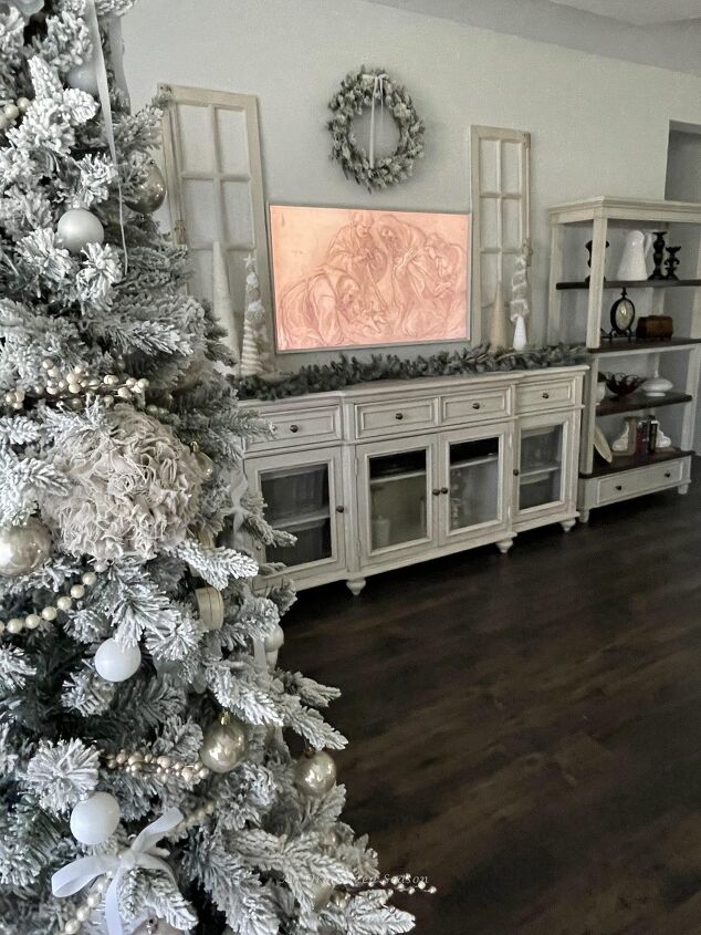 seven ways to decorate for christmas on a budget, A living room decorated for Christmas in neutral colors