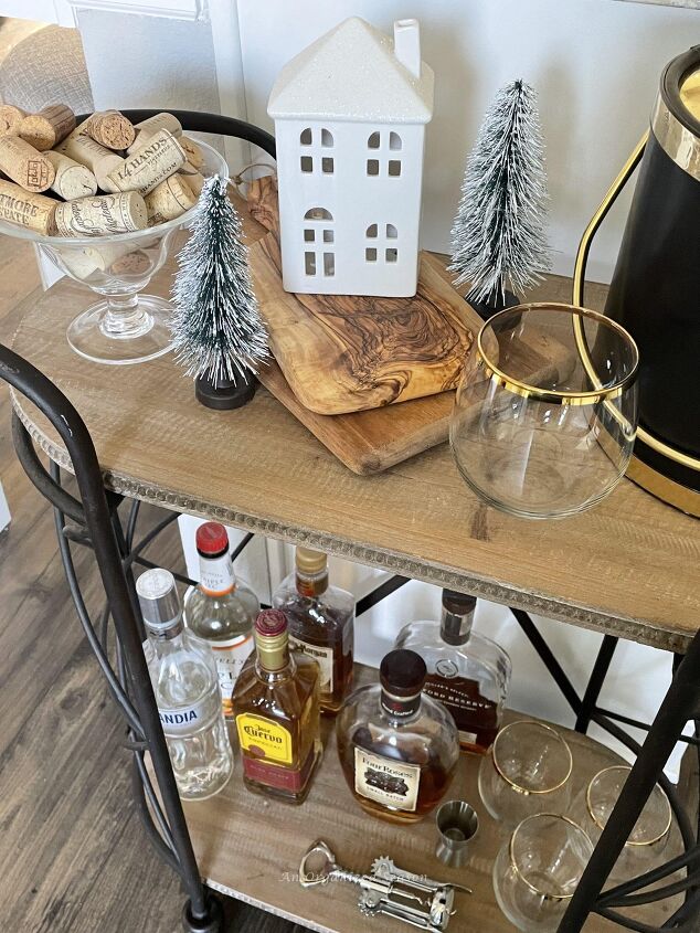 how to get organized for holiday entertaining, A bar cart decorated for holiday entertaining