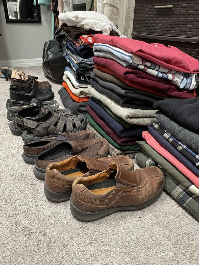 how to purge organize and store your clothes, Four folded piles of clothes and several pairs of shoes an example of how to purge your clothes