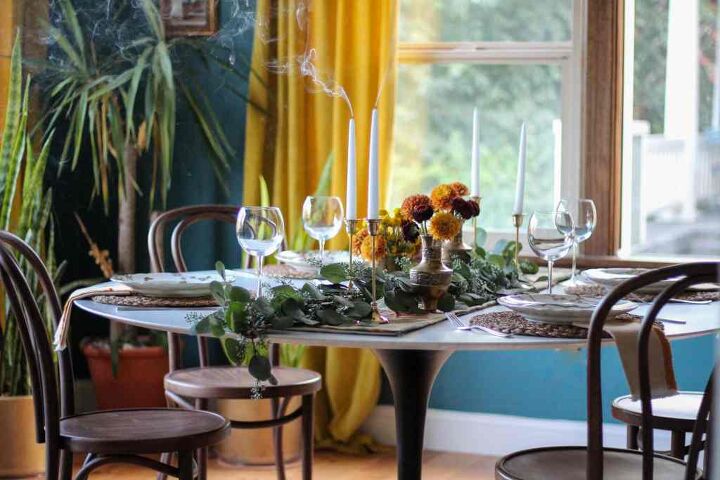 how to use a garland for everyday holidays, Dining room with tablescape of garland vintage brass vases full of flowers