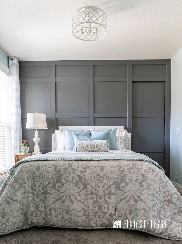 10 sensational home improvement ideas on a budget, Grey board and batten wall with a hidden pocket door Grey and white damask bedding with blue accents