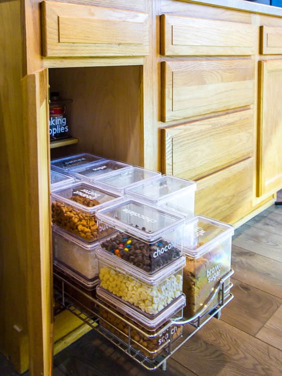 30 affordable pantry organization storage ideas you need to see, Pantry Organization Ideas Clear rectangle containers labeled with white vinyl lettering for baking suppies brown sugar sugar flour chocolate chips white chocolate peanuts