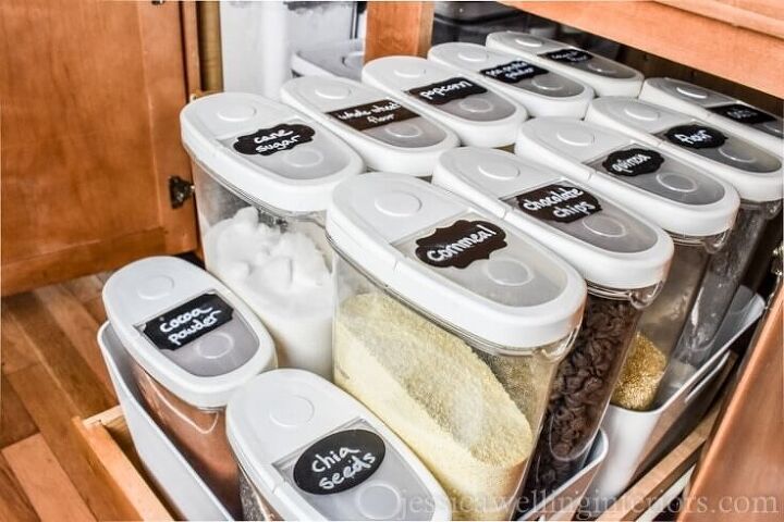 30 affordable pantry organization storage ideas you need to see, Pantry organization ideas Clear Ikea containers are used to organize pullout pantry drawer storage