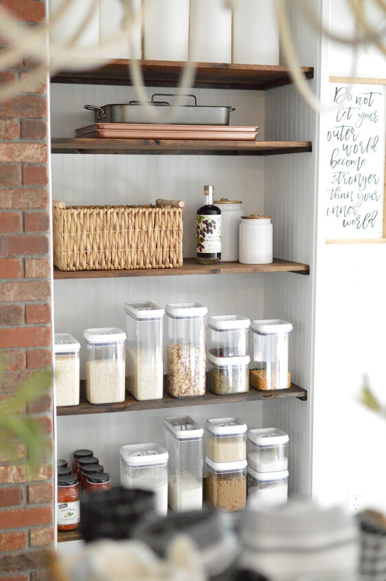30 affordable pantry organization storage ideas you need to see, Pantry Organization Ideas Create a pantry with wood shelves in a niche area Clear containers neatly organize dry goods backets provide storage for items that are not so pretty