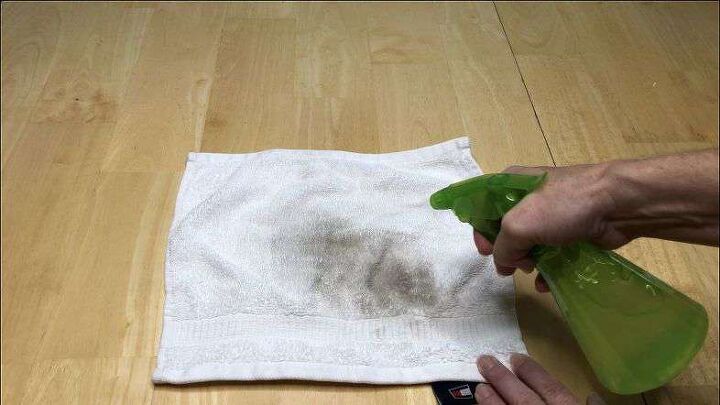 amazing diy laundry hacks that will save you money, Spraying the mixture on the stains