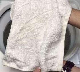 amazing diy laundry hacks that will save you money, Placing towel in washing machine