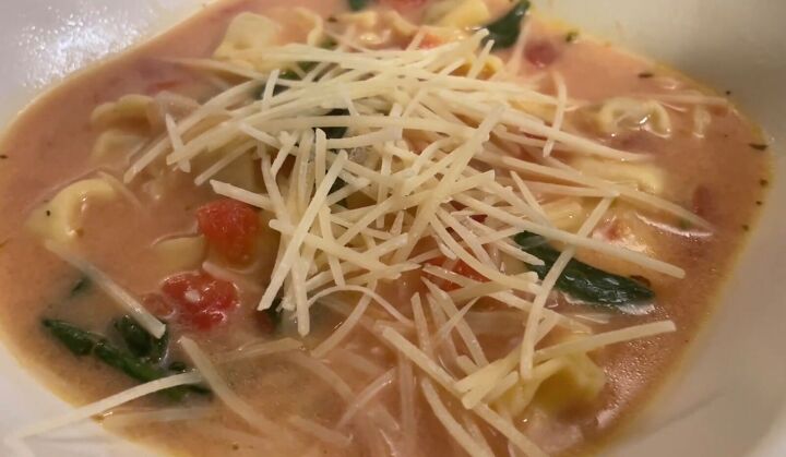 3 warm cozy soups for winter you can make on a budget, Topping the soup with parmesan cheese