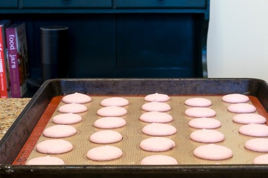 eco friendly products ideas for a sustainable kitchen, A silpat mat with macarons on it One of the suggested eco friendly products for a more sustainable kitchen