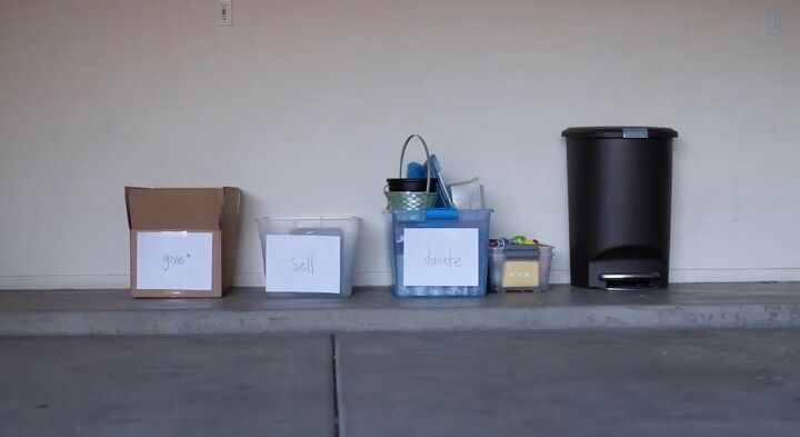 how to easily declutter your garage in 6 simple steps, Sorting items into boxes