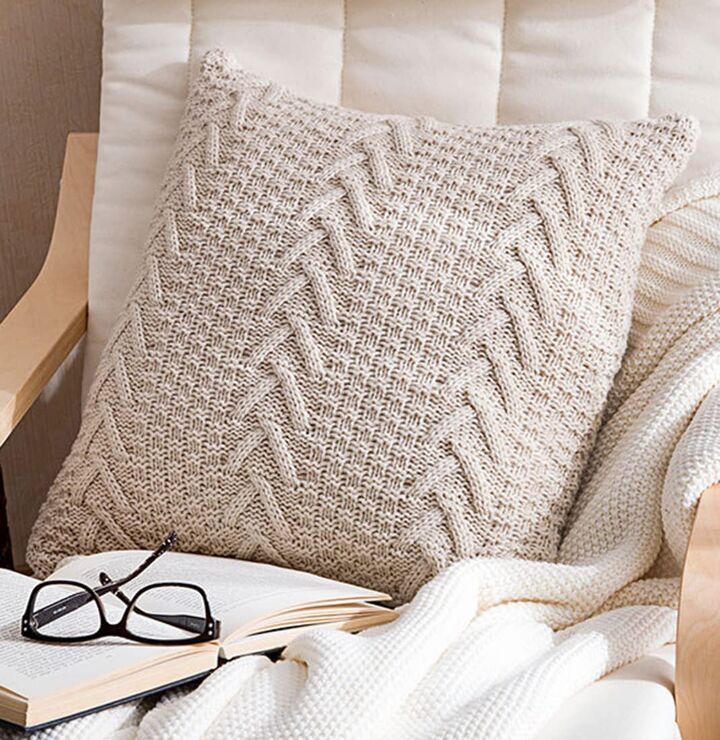 16 best places to buy beautiful budget throw pillows under 30, Knitted neutral throw pillow