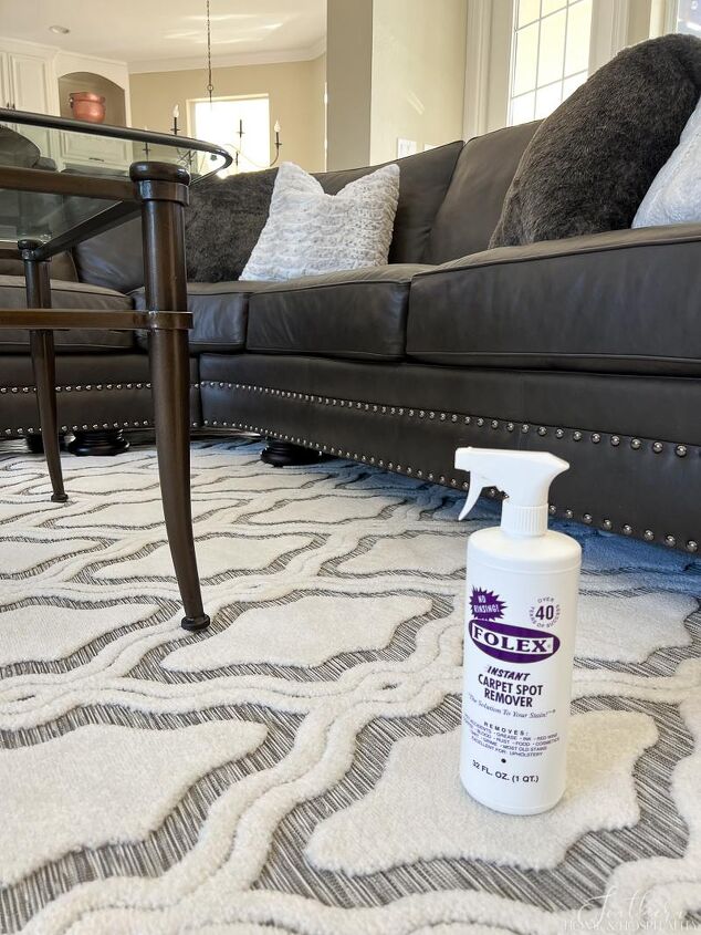 over 30 cleaning tools that make life easier, Folex carpet cleaner bottle sitting on rug
