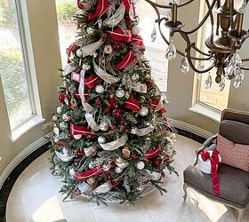 how to pack christmas decorations to make it easier next year, Christmas tree with red bow topper