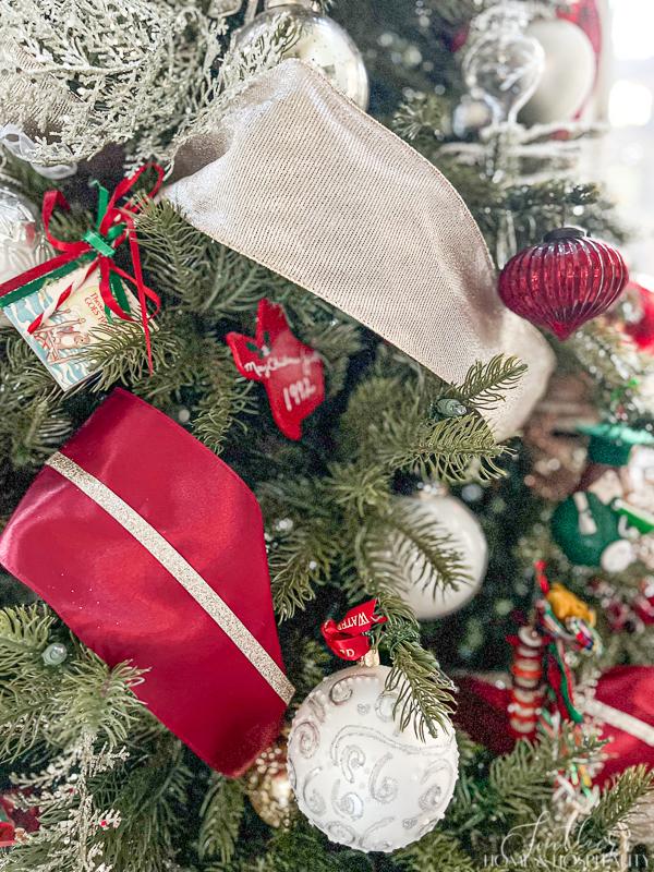 how to pack christmas decorations to make it easier next year, ribbon on a Christmas tree
