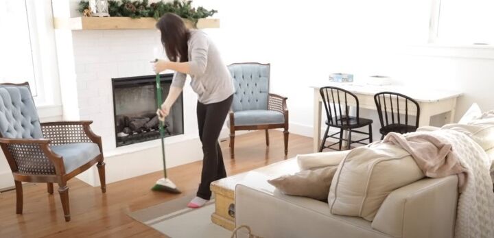 11 clean habits that can help you keep a busy family home tidy, Sweeping the floor