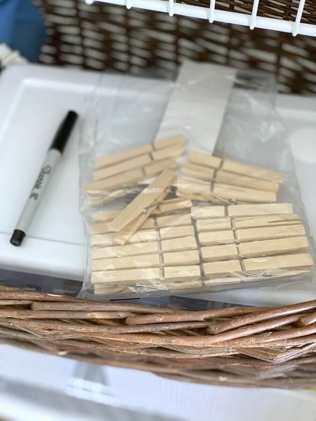 a budget friendly linen closet makeover, Clothespins and a sharpie are great tools for labeling linen closet storage bins