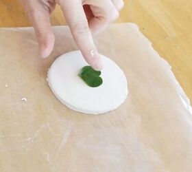 3 easy diy valentine s gifts that only take 5 minutes to make, Adding clover leaves to the clay
