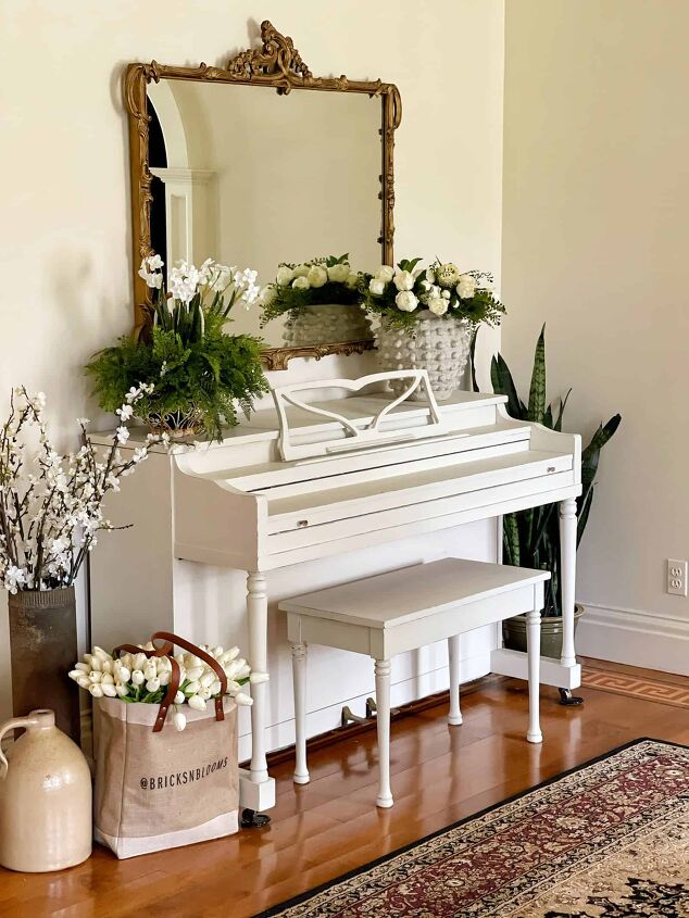 7 easy ways to make faux flowers look real, thrift shop finds the mirror over a painted piano with vintage market finds faux flowers and greenery