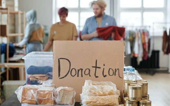 the benefits of decluttering your possessions, donation box