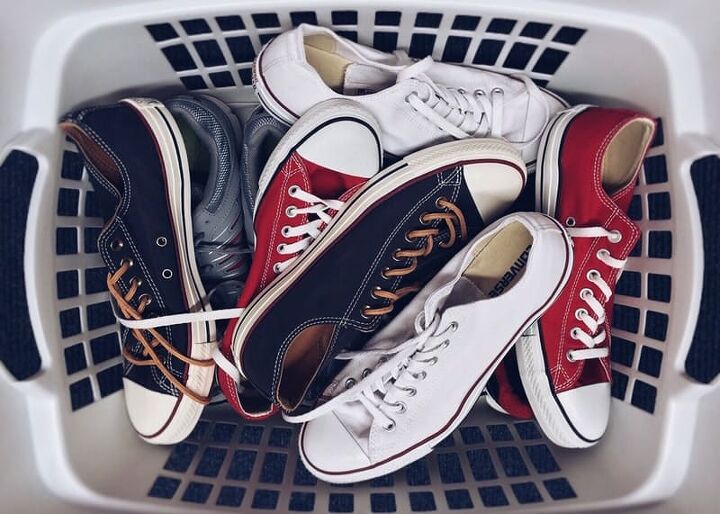 how to declutter your kitchen, a basket full of athletic shoes