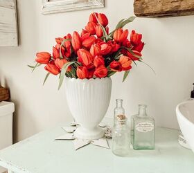 the best thrifted valentine s decor ideas, Milk Glass Vase filled with red tulips and old green bottles for Valentine s Decor Ideas
