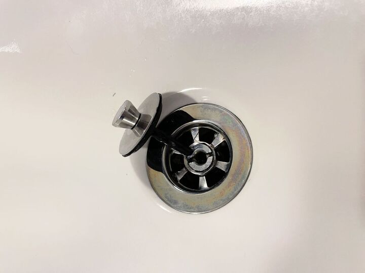 bathroom repairs to try yourself before you call a plumber, Bathroom sink drain clogged with hair