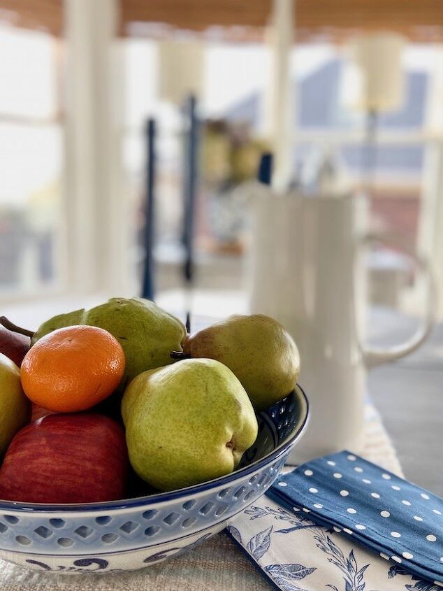 how to accessorize a kitchen 20 easy decor tips, Blue and White Bowl with Fruit Centerpiece
