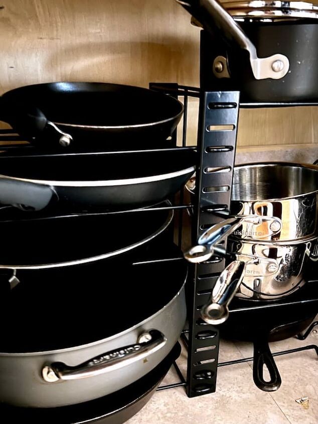25 simple ideas for how to declutter your kitchen, Declutter your kitchen with this pot and pan organizer