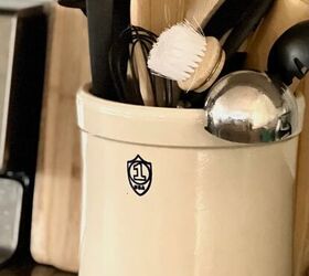 25 simple ideas for how to declutter your kitchen, Declutter Your Kitchen Counters with a stone crock utensil organizer