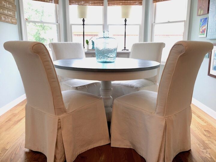 how to accessorize a kitchen 20 easy decor tips, Kitchen with Slipcovered Dining Chairs