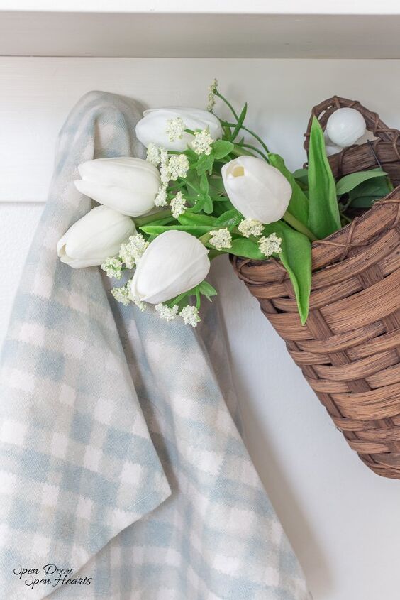 7 beautiful thrifty european farmhouse spring home accessories, Tulips in a vintage basket Spring home accessories
