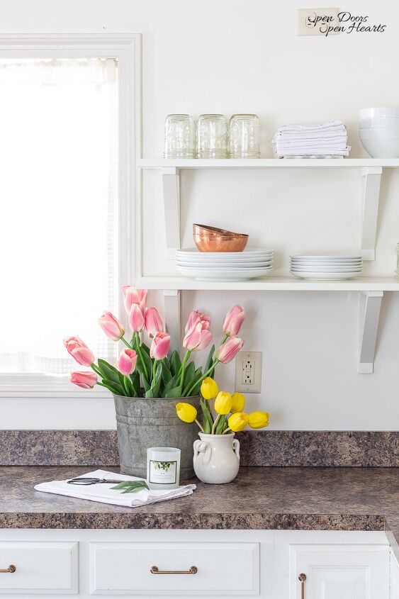 simple beautiful spring decor ideas spring home tour, A vintage galvanized bucket filled with Spring tulips sitting on the kitchen counter