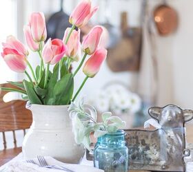 simple beautiful spring decor ideas spring home tour, Table centerpiece with tulips a lamb mold and a vintage bread board for Spring decor