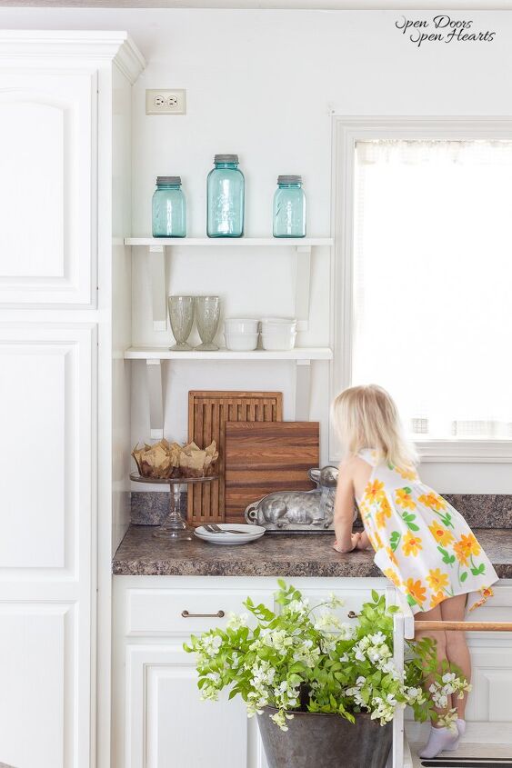 simple beautiful spring decor ideas spring home tour, white kitchen with blue mason jars on open shelves for Spring decor