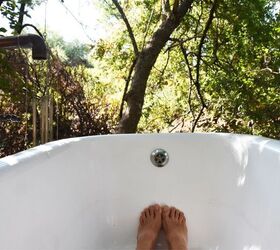 This incredible treehouse actually features an outdoor bath