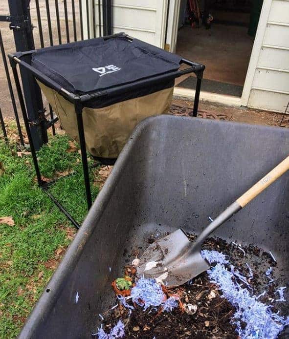 5 easy things to do with food scraps, wheelbarrow full of compost and setting up a worm bin