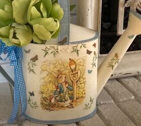 15 easy diy spring decor projects to make with thrifted items, Spring watering can
