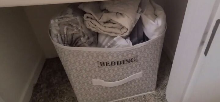 spring cleaning on a budget how to organize your linen closet, Bedding shelf